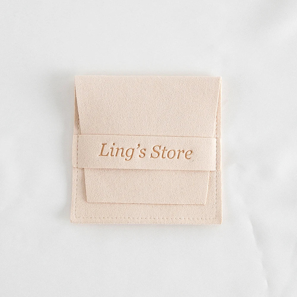 50/100 Stück schicke individuelle Logo Schmuck Microfaser Streifen Tasche Rose Beige Rosa Umschlag Samt Ring Ohrring Anhänger Halskette Ohrstecker Beutel