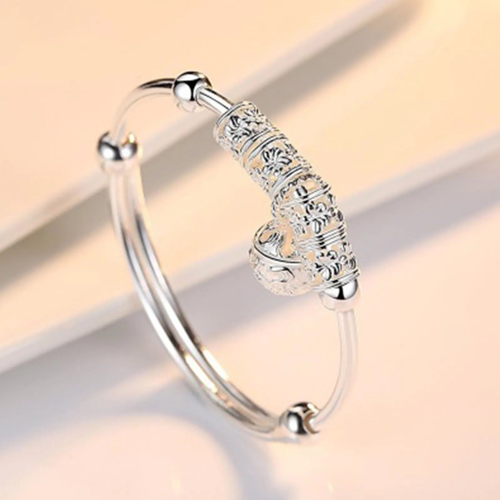 Feinsilberfarbene Hohle Glockenkugel-Armreifen, verstellbare Armbänder für Damen, modische Weihnachtsgeschenke, Party-Hochzeitsschmuck
