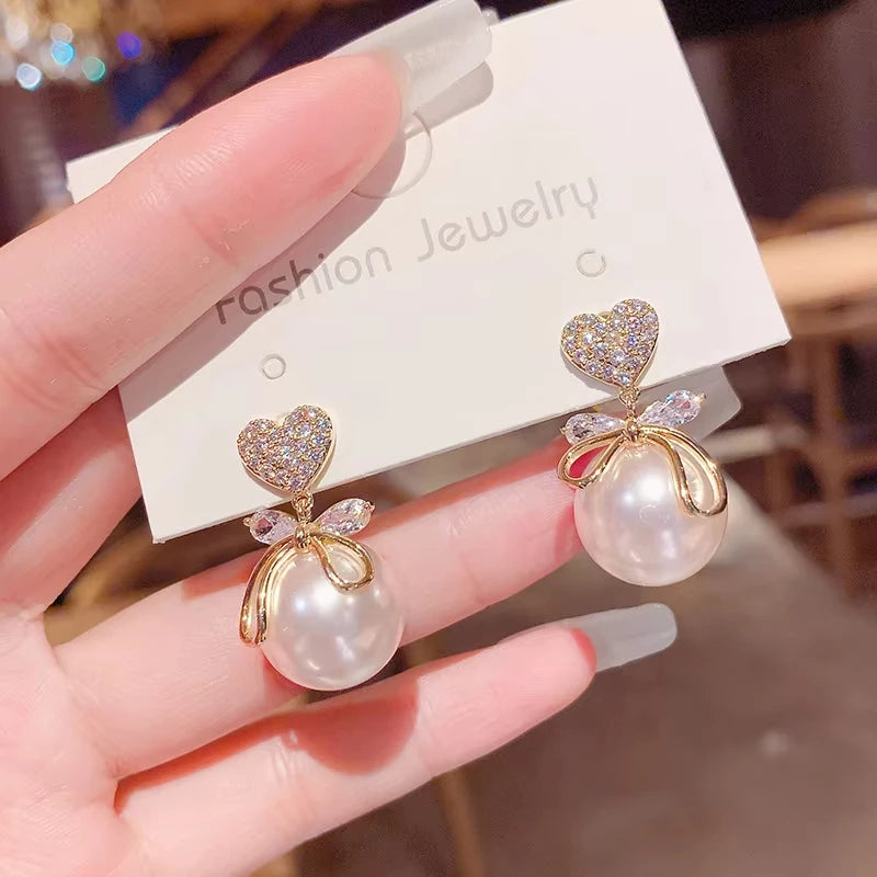 Koreanische Herz-Ohrhänger für Frauen Mädchen Romantisches Valentinstagsgeschenk Modeschmuck Trend Hängende Perle Niedlicher Schleifen-Ohrring