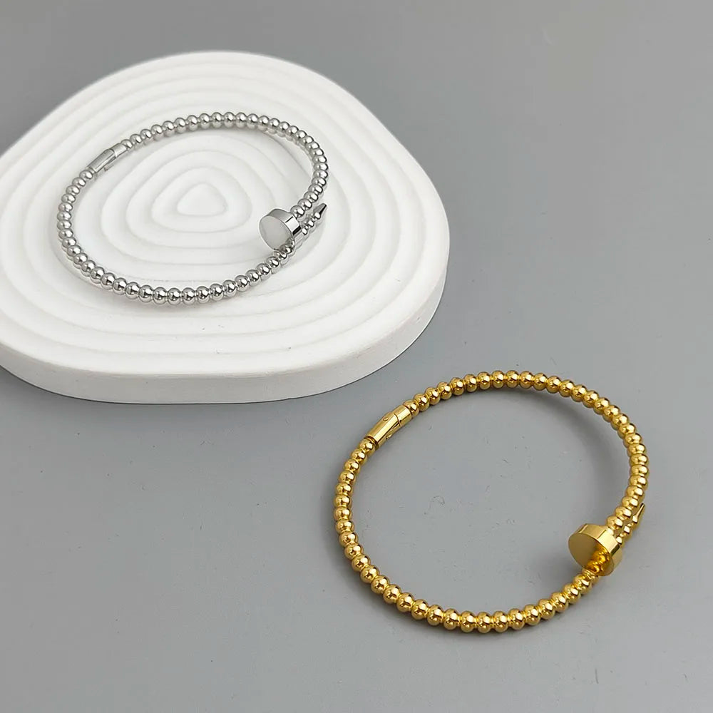 Schlichtes Armband aus rundem Perlen-Nagel, vergoldeter Edelstahl, Damenarmband, wasserdichtes und rostfreies Armband, von Paaren getragen
