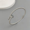 Schlichtes Armband aus rundem Perlen-Nagel, vergoldeter Edelstahl, Damenarmband, wasserdichtes und rostfreies Armband, von Paaren getragen