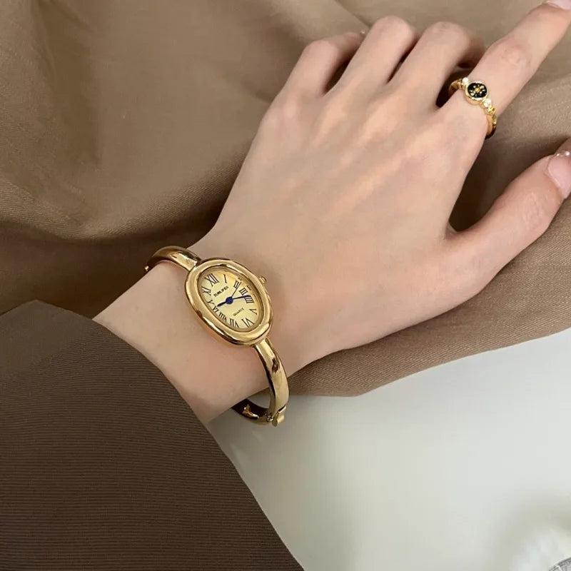 Berühmte Marke Damen Quarzuhr Mode Luxus Gold Armbanduhr Geschenk Damen römische Zifferblatt Armbanduhr Dropshipping Uhr