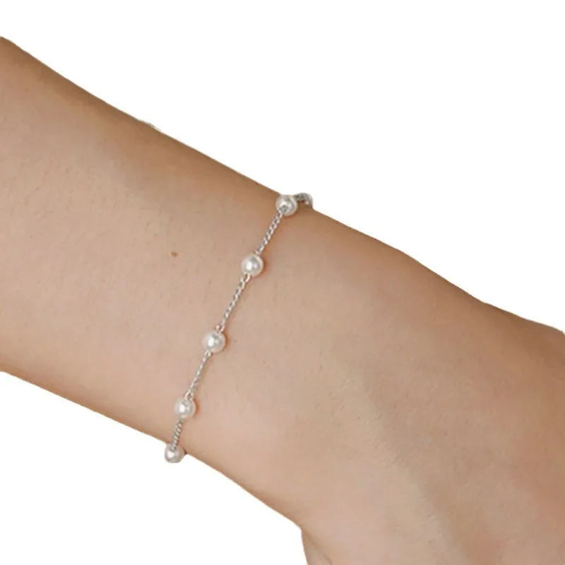 Neues schlichtes Imitationsperlenketten-Armband für Damen, modisches Temperament, goldfarbenes Kettenarmband, Party-Handschmuck