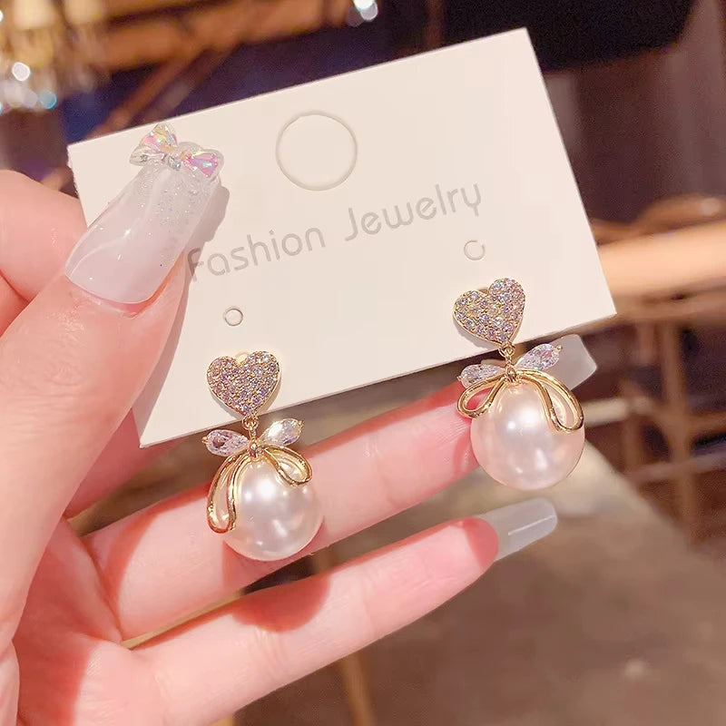 Aretes colgantes coreanos en forma de corazón para mujer, niña, regalo romántico de San Valentín, joyería de moda, perlas colgantes, aretes bonitos con lazo