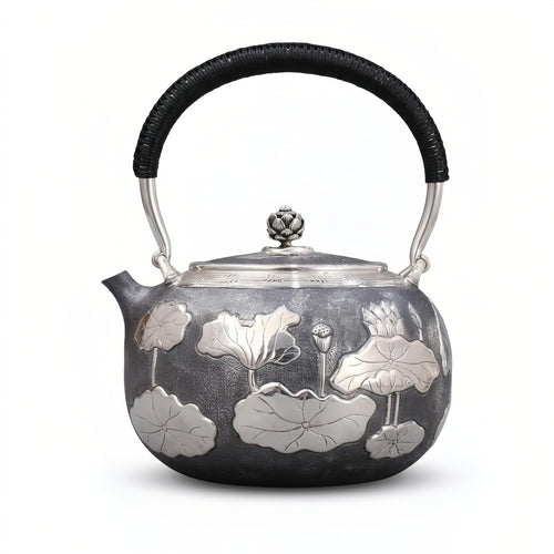 925 Sterling Silver Artisan Crafted Silver Teapot Featuring Embossed Lotus Pond Motif and Black Cord Handle - Handicraft