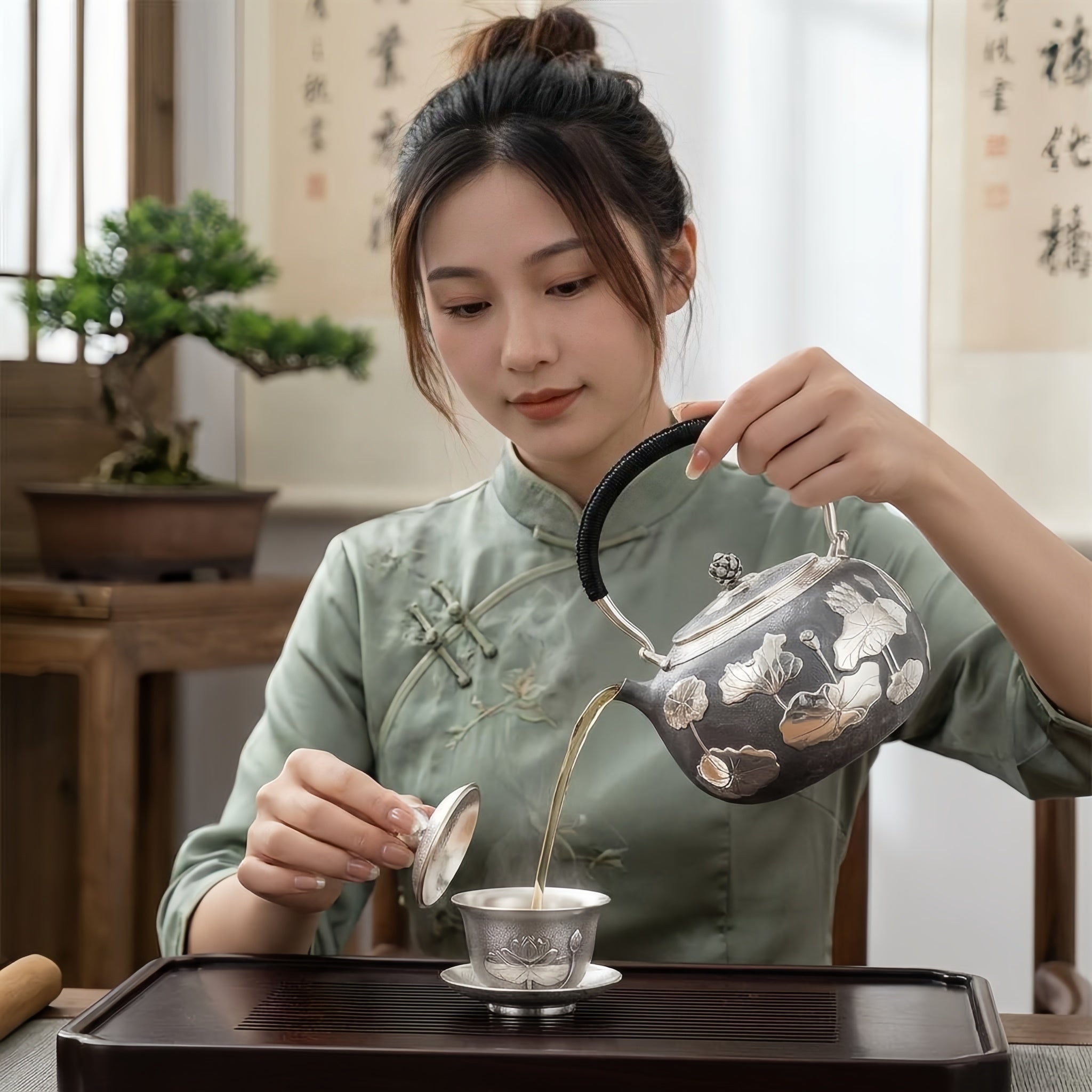925 Sterling Silver Artisan Crafted Silver Teapot Featuring Embossed Lotus Pond Motif and Black Cord Handle - Handicraft