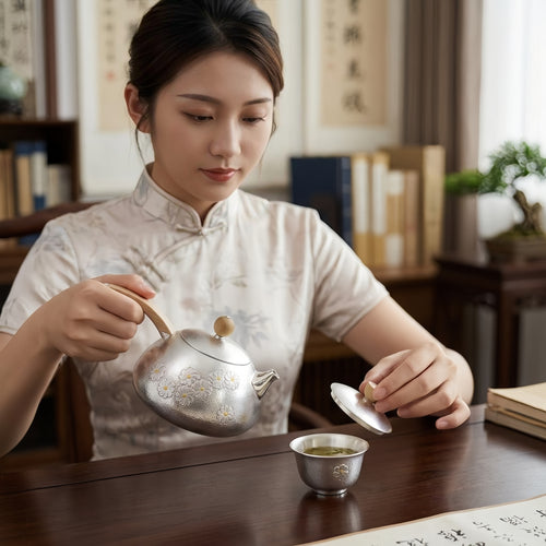 Pure 999 Fine Silver Hand-Hammered Silver Teapot with Delicate Floral Engravings and Sandalwood Handle - Handicraft